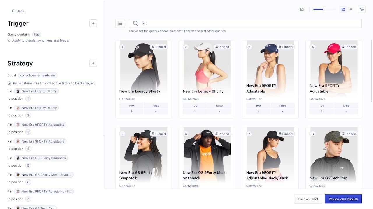 For the search query hat, selected products are pinned to the top of the search results